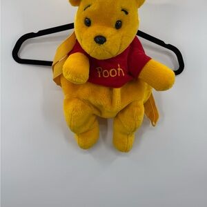 Vintage Winnie the Pooh Yellow Plush backpack.